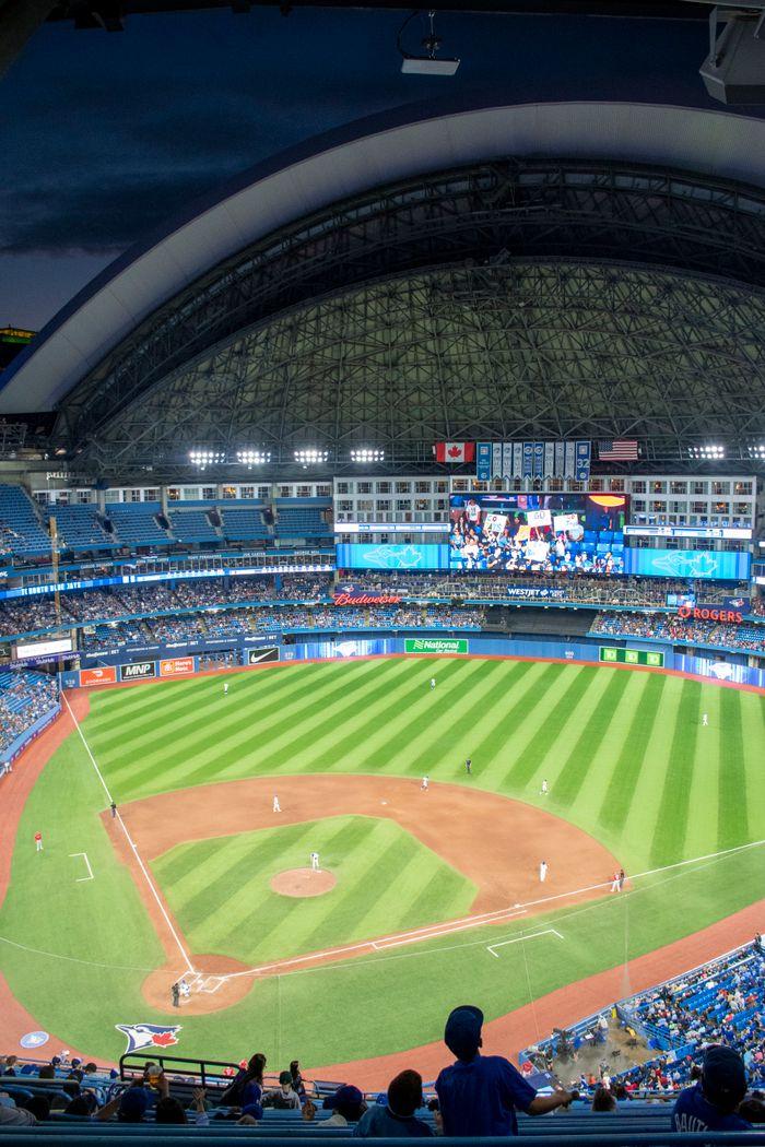 Home Enjoy a vibrant night at Rogers Centre with a baseball game in full swing under the dome.